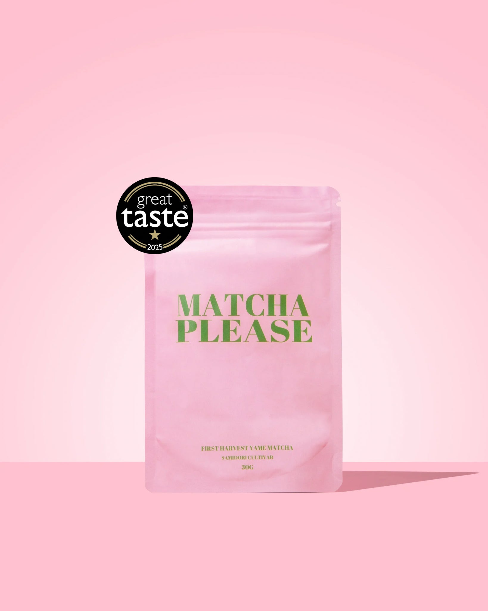Matcha Please packaging with Great Taste award on a pink background
